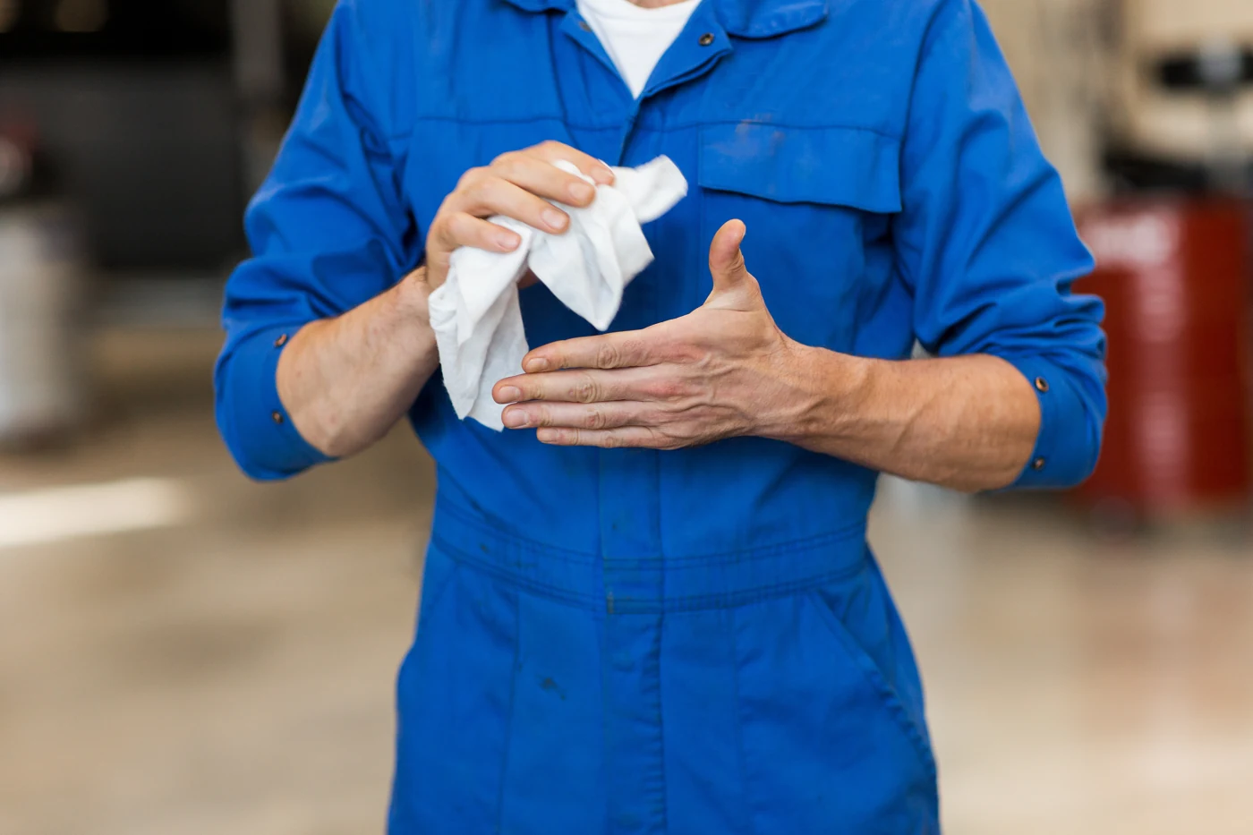 Cleaning hands with UltraGrime clothwipes